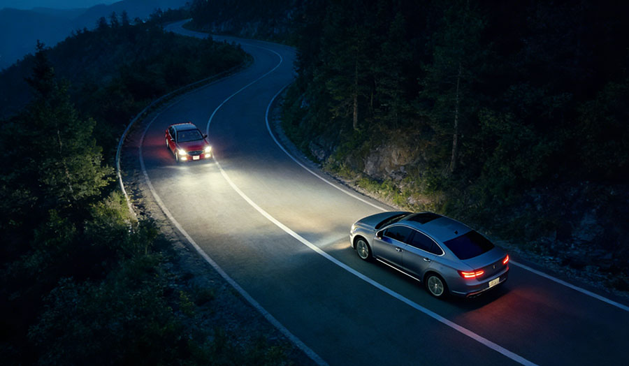 How far should your headlights shine while on low beam?